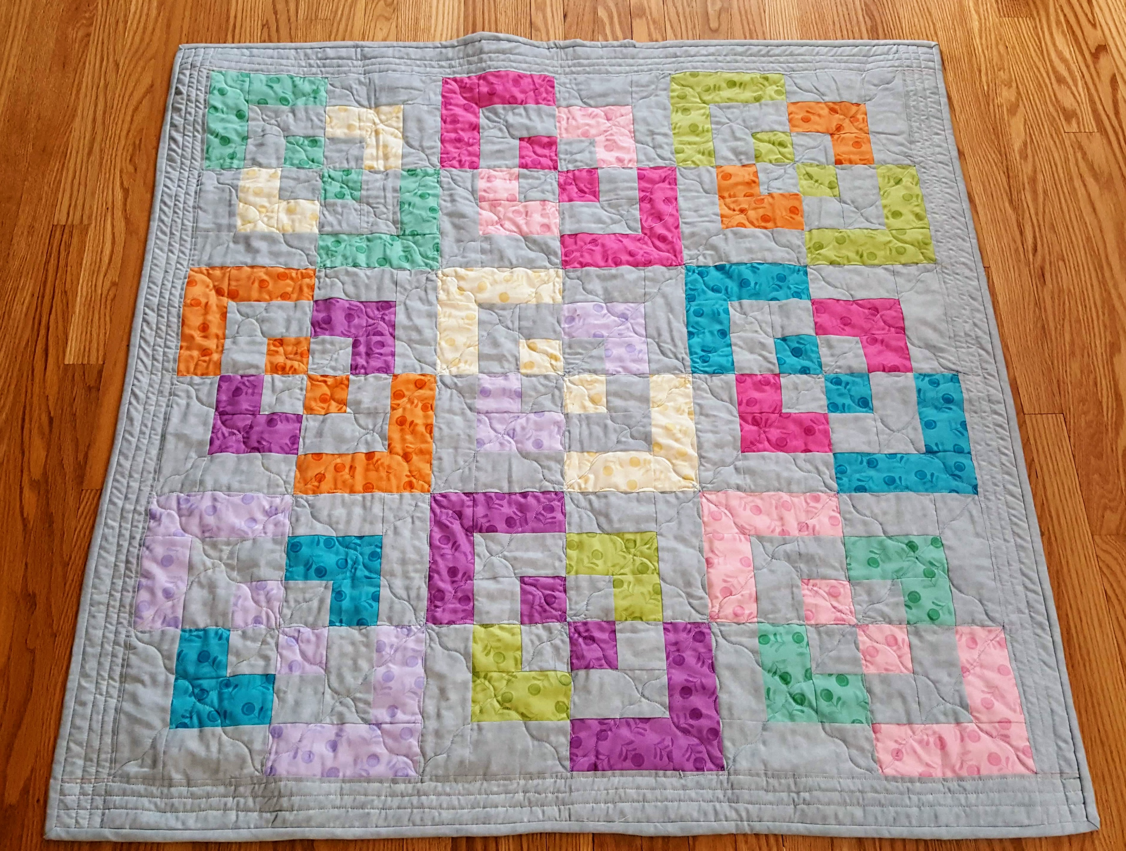bento box baby quilt with gray