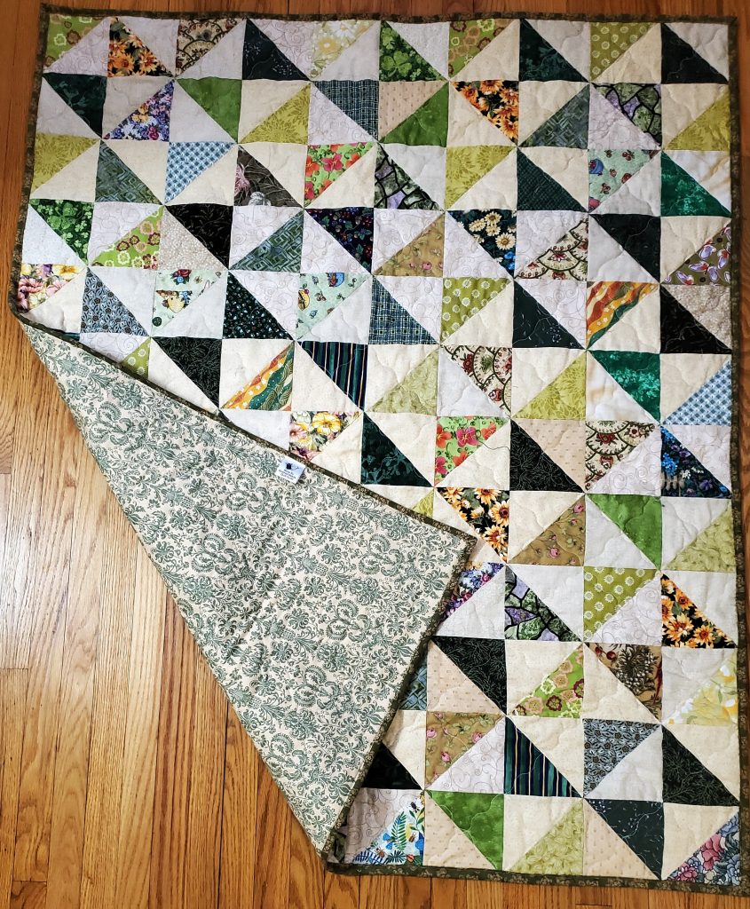 Broken Dishes Quilt showing the backing and binding