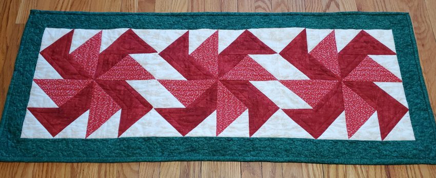 Whirling Stars Christmas Table Runner